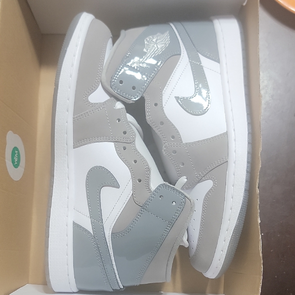 Jordan Gray and White High-Top Sneakers